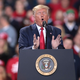 Image of the president almost done fucking America.